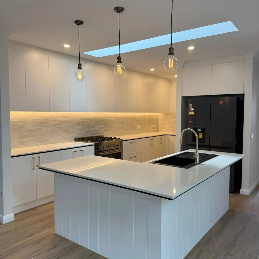 Modern kitchen with island bench and pendant lighting